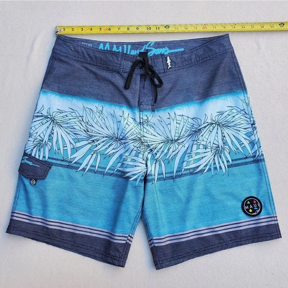 Maui and Sons blue gray and black board shorts